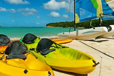 Sea Kayaks and sailing boats in Antigua Experience the Ultimate Kayaking Tour in Antigua feature