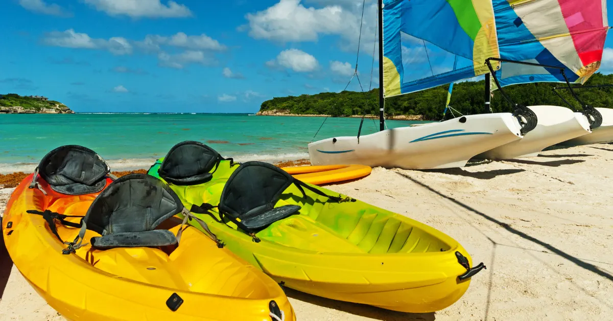 Sea Kayaks and sailing boats in Antigua Experience the Ultimate Kayaking Tour in Antigua feature