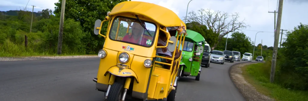 coloful tuk tuk on the street rock adventures antigua