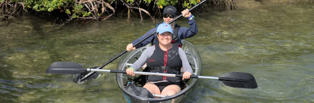 people kayaking on clear boat eco adventures rock adventures antigua image 5